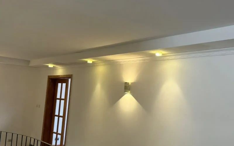 Gypsum ceilings, downlights and wall brackets lighting